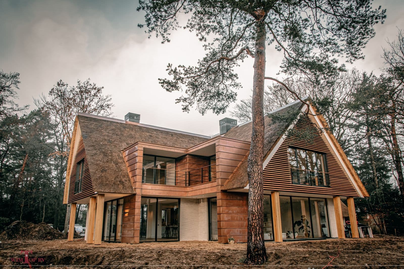 Woning met dakkapellen waarvan het houtwerk is geschilderd door Keistad Schilderwerken